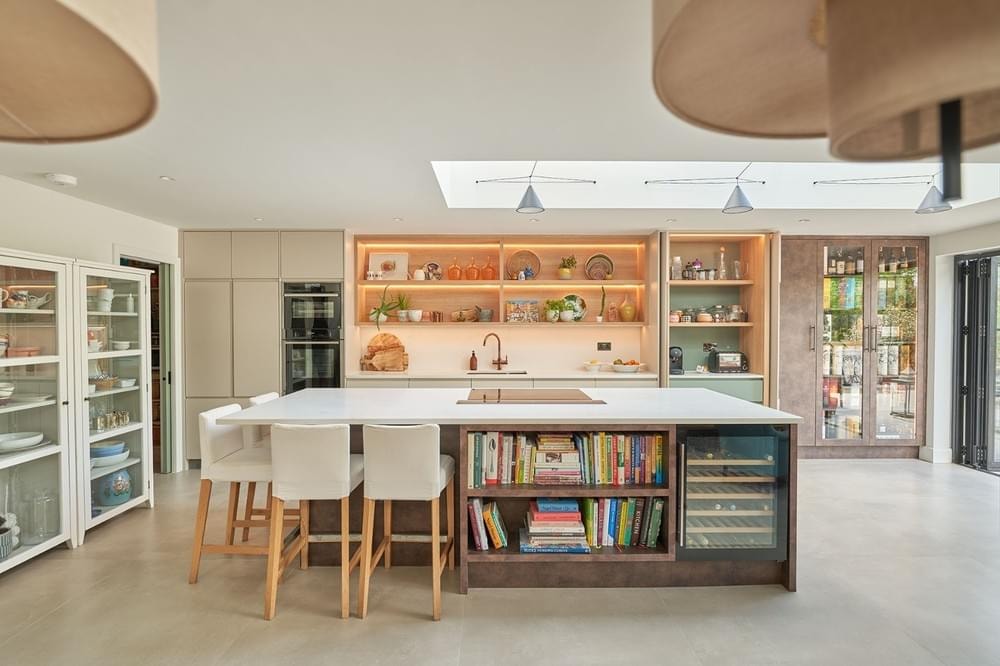Open plan kitchen with island and skylights — RPR design and build