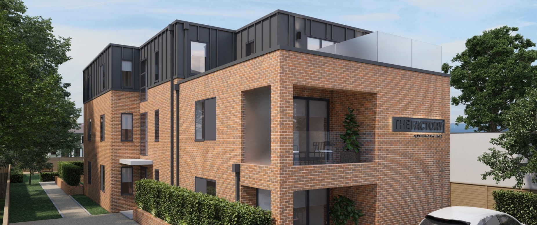 The Factory Apartments — CGI showing brick and dark metal standing-seam cladding