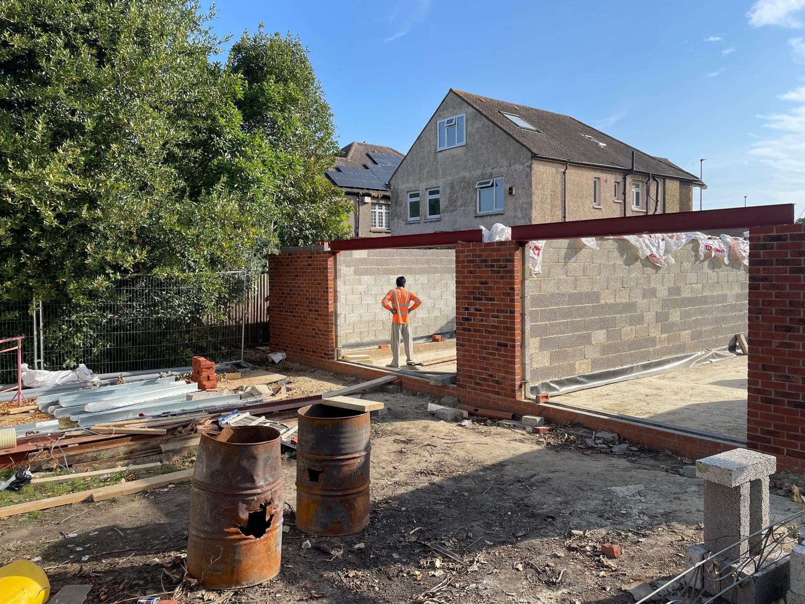 Gunnersbury Avenue — existing house rear garden view with conservatory extension