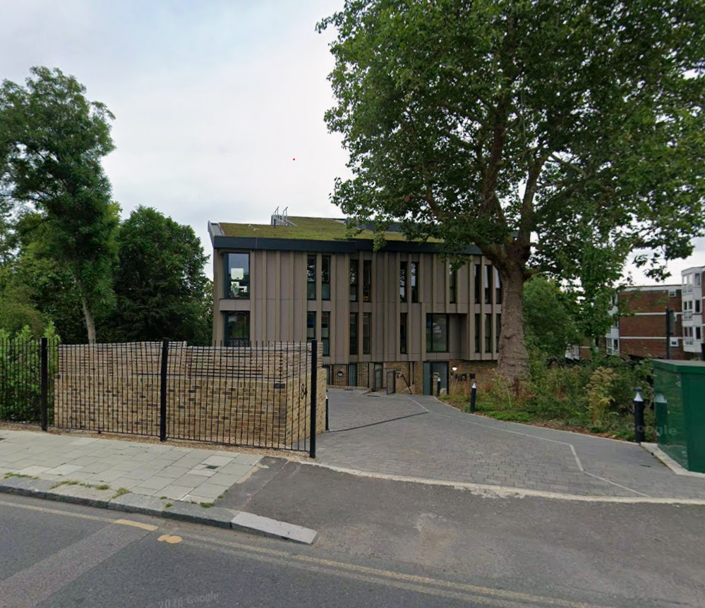 Ravensbourne Park — completed building showing timber cladding and brick base from street