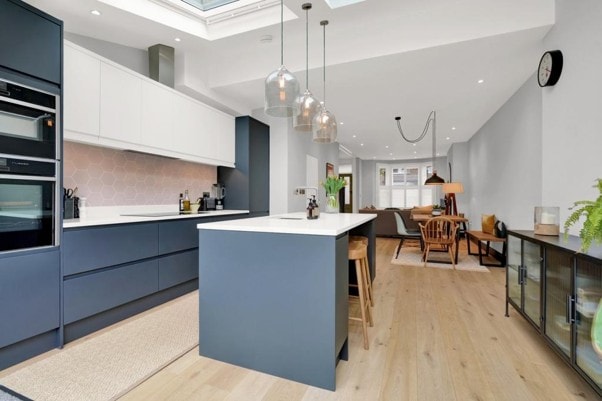 Salisbury Road — kitchen dining area with pendant lighting and skylights