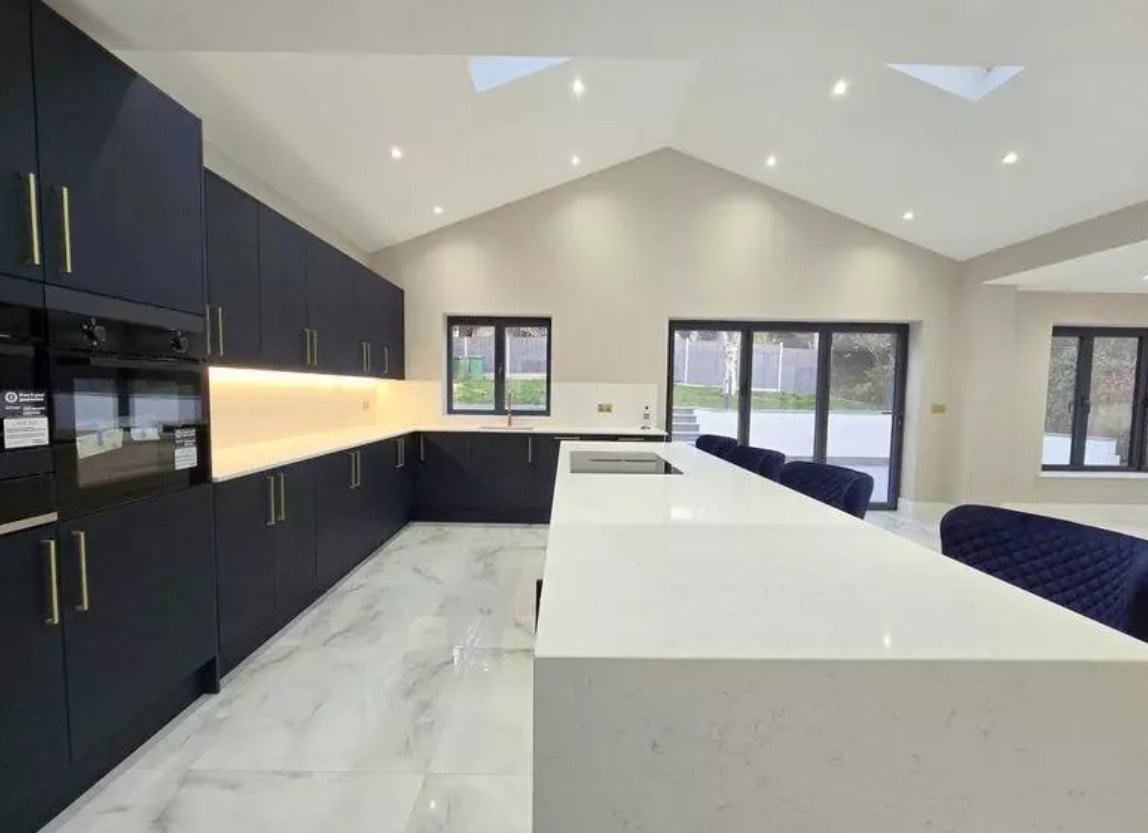 3 Warburton Close — completed front elevation from street showing full width of the extended property