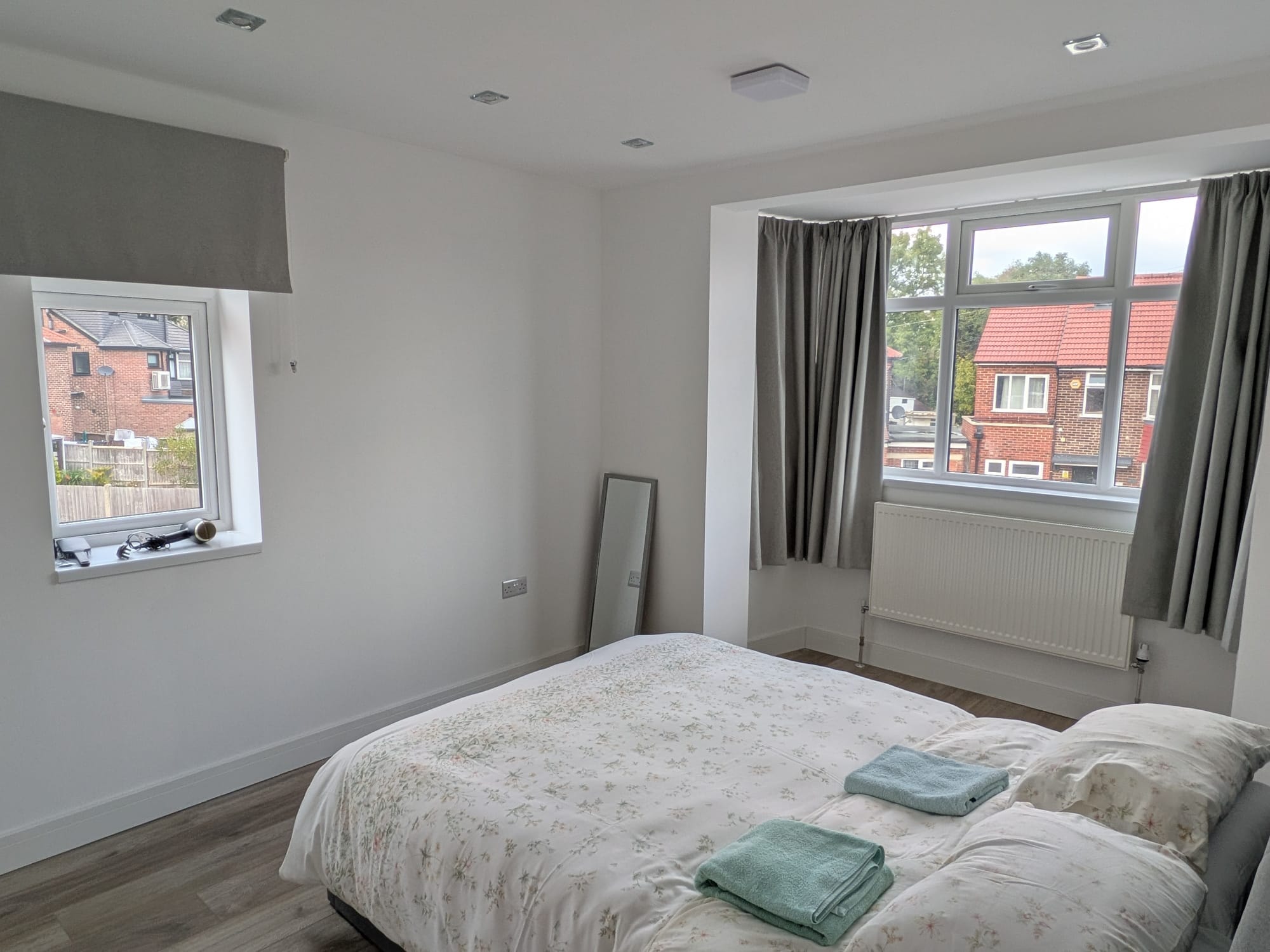 Orchard Gate — double bedroom with large windows overlooking the street