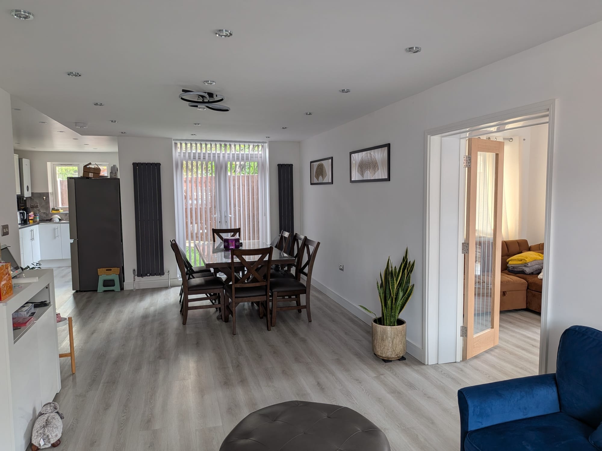 Orchard Gate — open-plan dining and living area with garden access
